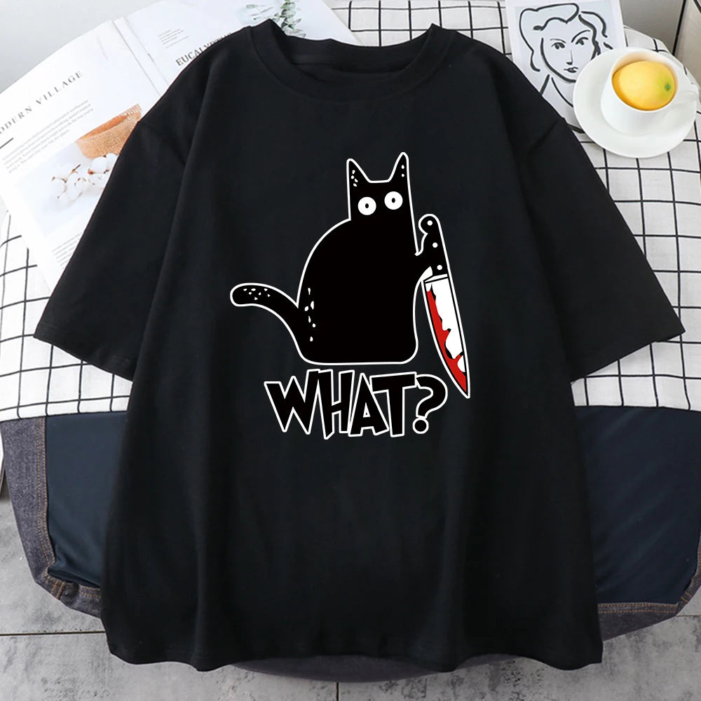 Black tee laid flat, showing the loose oversize body