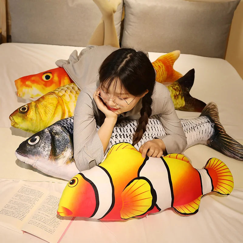 The clownfish lying in front of the three carp - the book and bedding are not included