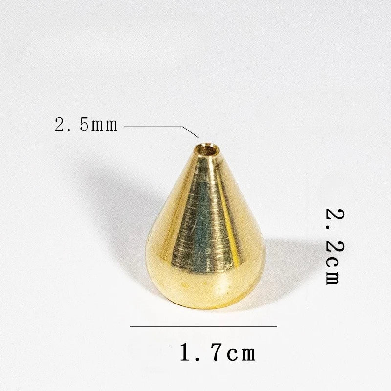 Maker's measured photograph of the tall cone: 2.2 cm tall, 1.7 cm wide, with a single 2.5 mm hole