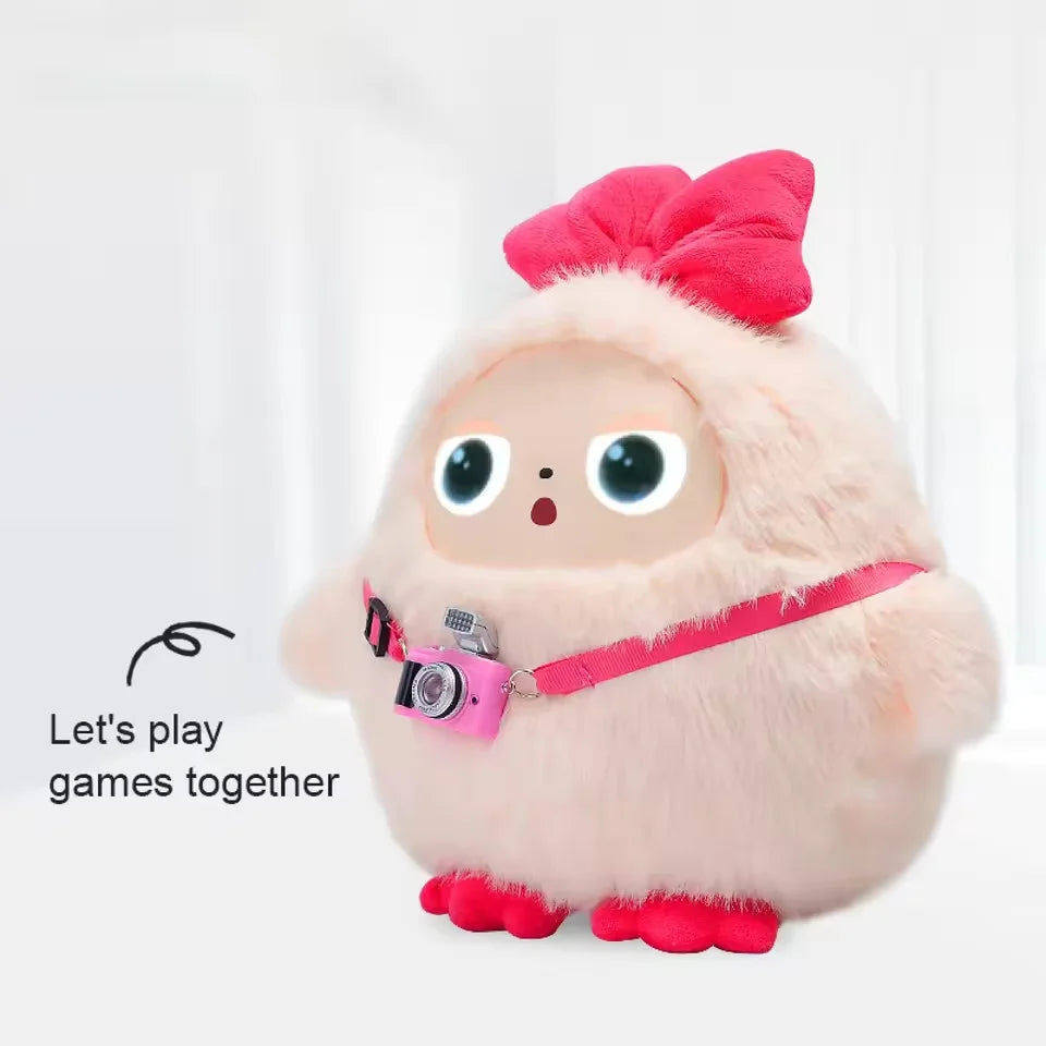 Cream furry plush creature with a vinyl face, large round eyes, a red bow on its head and a small pink toy camera on a strap