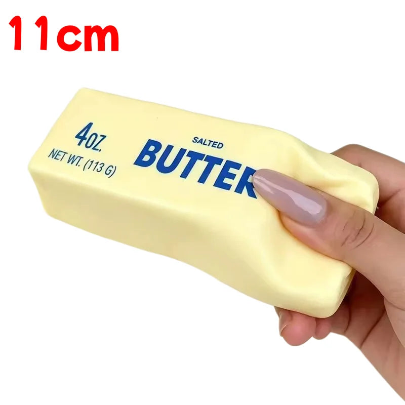Yellow Butter 11cm, the small salted block held in a hand