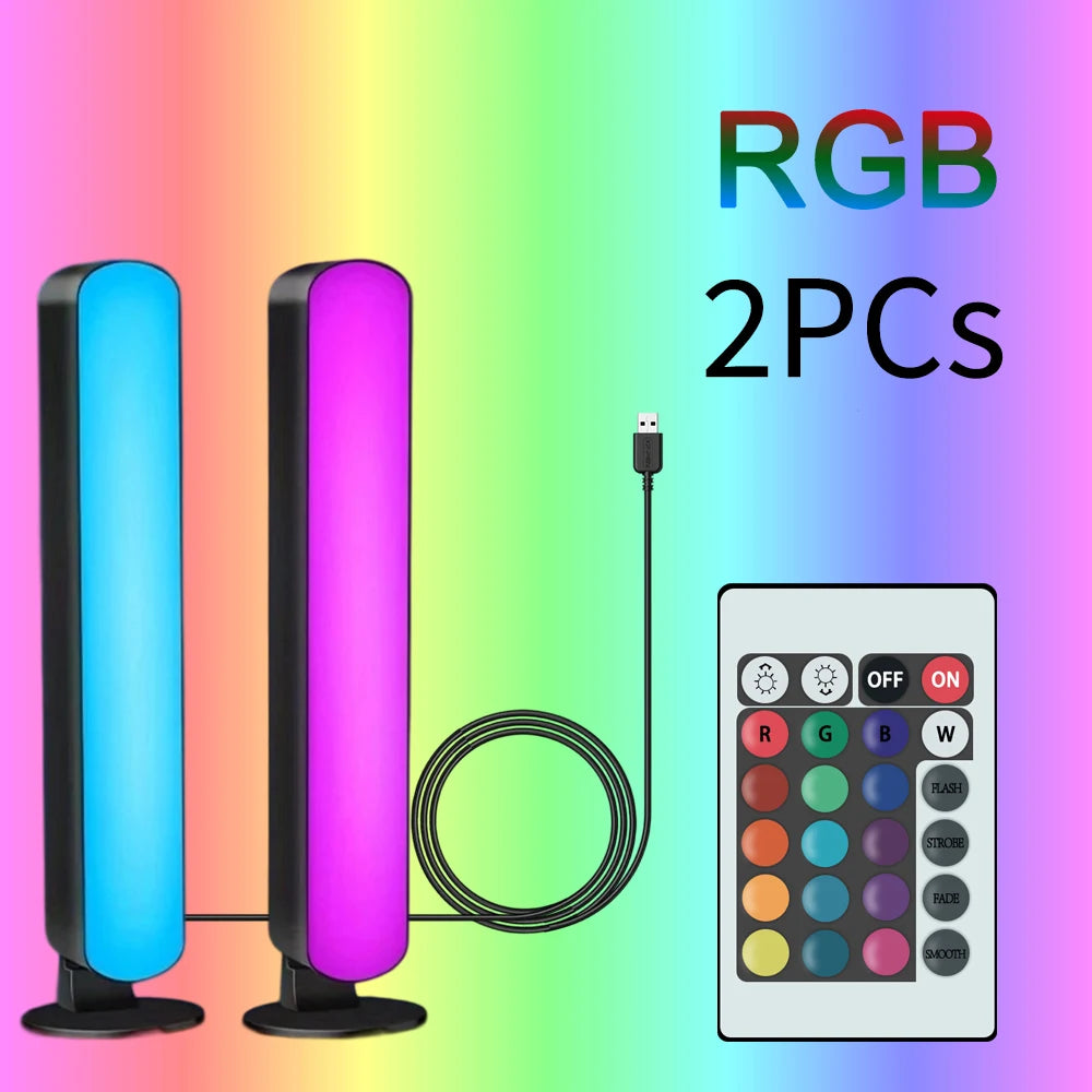 Two light bars standing side by side in cyan and pink, with the USB cable and the 24-key remote