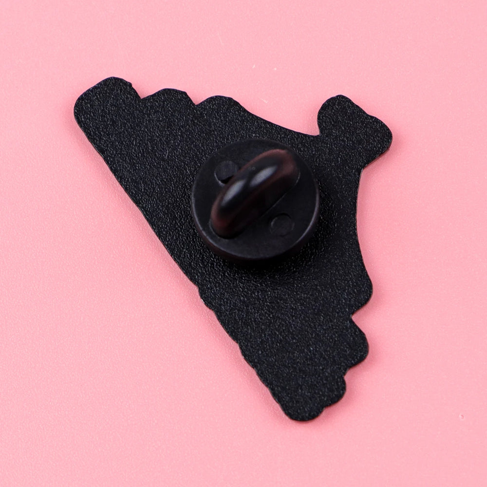 Back of the pin showing the post and black rubber clutch