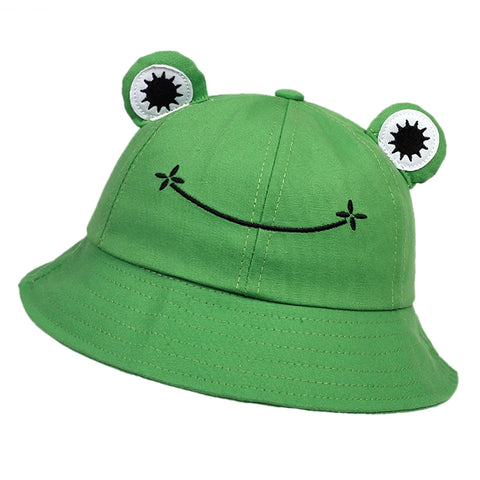 Green cotton bucket hat with applique frog eyes and an embroidered smile