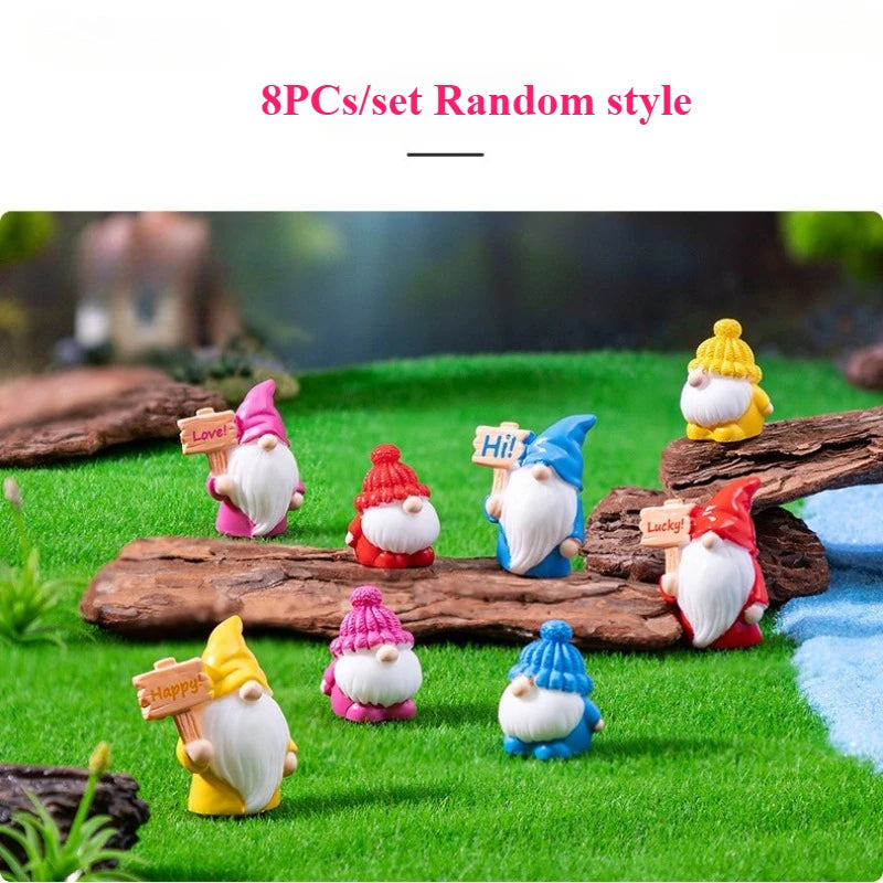 The eight-piece pack, shown as a random assortment on a driftwood log - the exact colours and signs you receive will differ
