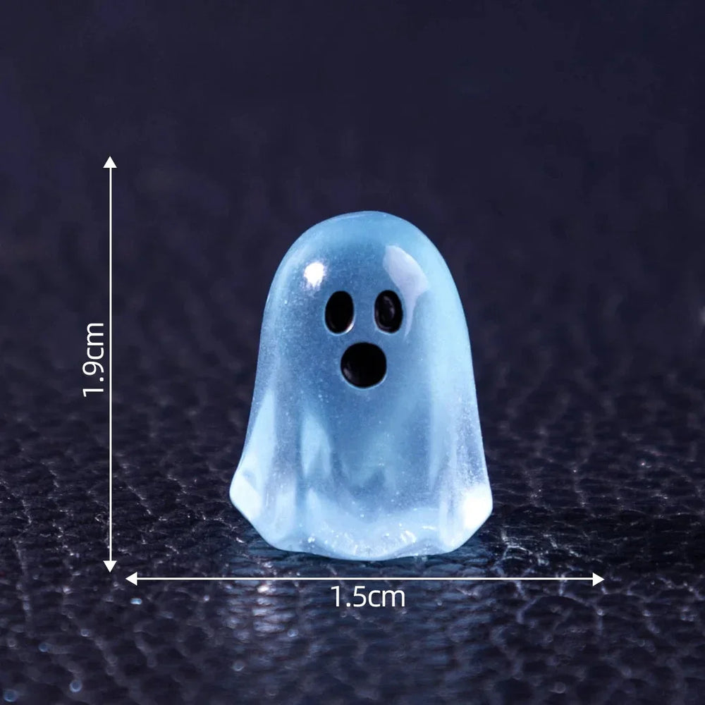 Maker scale drawing: one ghost is about 1.9 cm tall and 1.5 cm wide