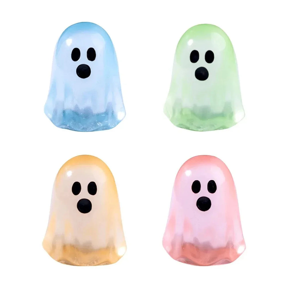 Four of the mini ghosts on a white background - blue, green, orange and pink