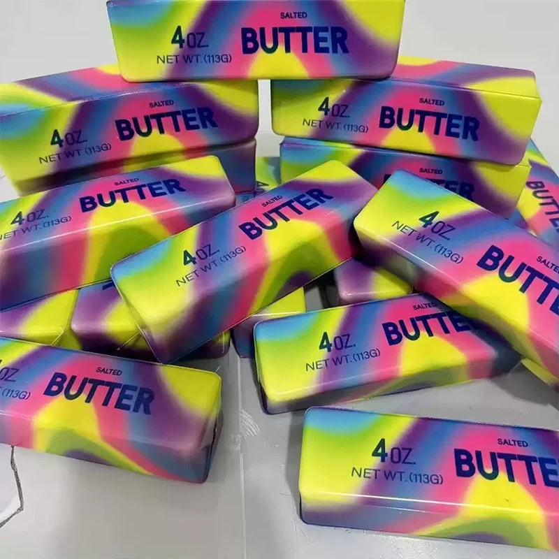 A heap of rainbow-finish squishy butter blocks