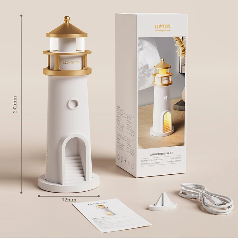 The unlit lighthouse beside its retail carton, marked 242mm tall and 72mm across the base, with a printed manual, a small white sailboat piece and a coiled white USB cable laid out alongside