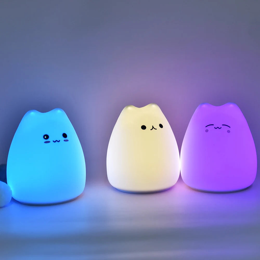 The lights glowing blue, warm white and purple in a dark room