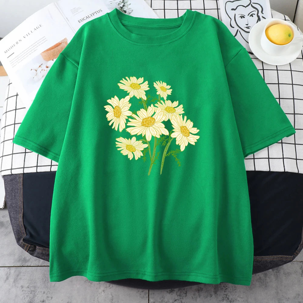 Green short-sleeve cotton t-shirt printed with a bouquet of yellow and cream daisy-like chrysanthemums