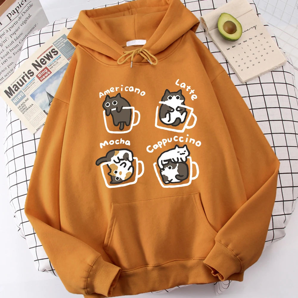 Warm camel khaki pullover hoodie with a front print of four cartoon cats in outlined coffee mugs