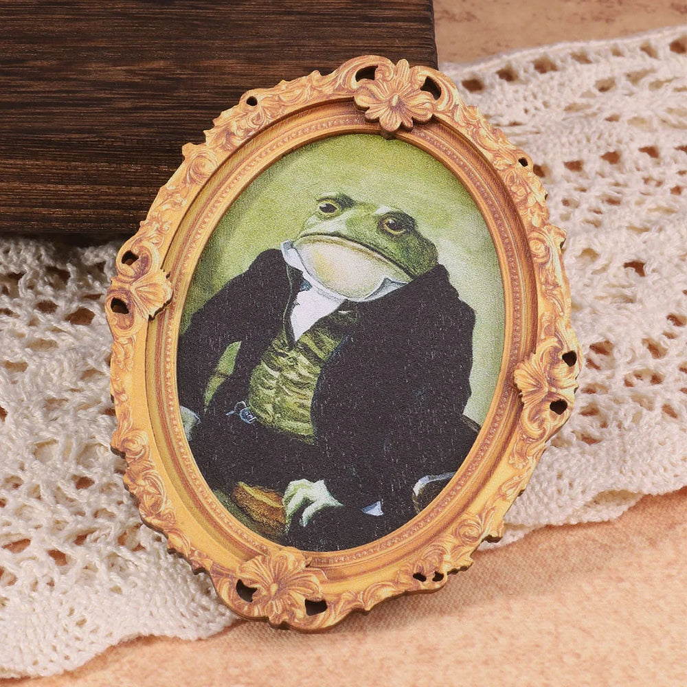 The frame magnet lying on lace beside a wooden surface