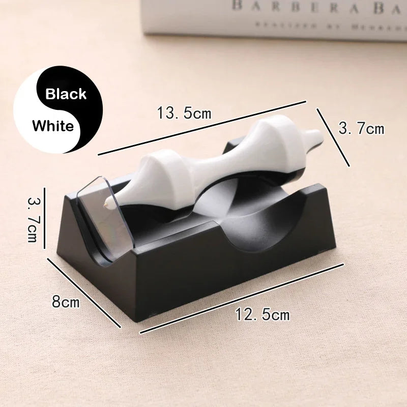 Black and white top with base measurements, 12.5 by 8 cm