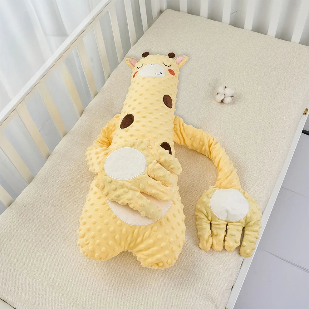 The yellow giraffe design with brown spots, lying on a cot mattress