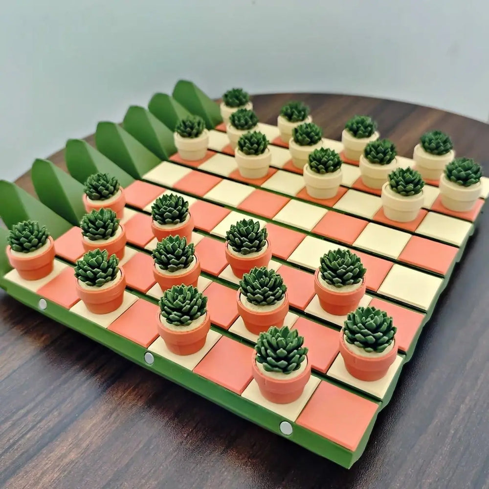 The board photographed with every piece as the same rosette succulent, metal discs visible along the rim