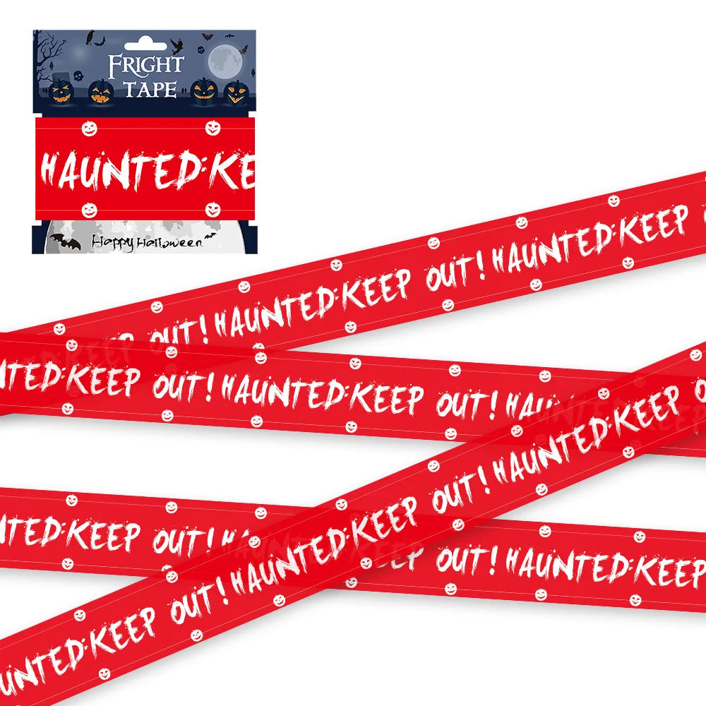 Red barrier tape printed with haunted keep out