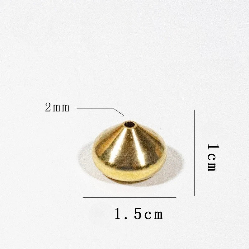 Maker's measured photograph of the low cone: 1 cm tall, 1.5 cm wide, with a single 2 mm hole