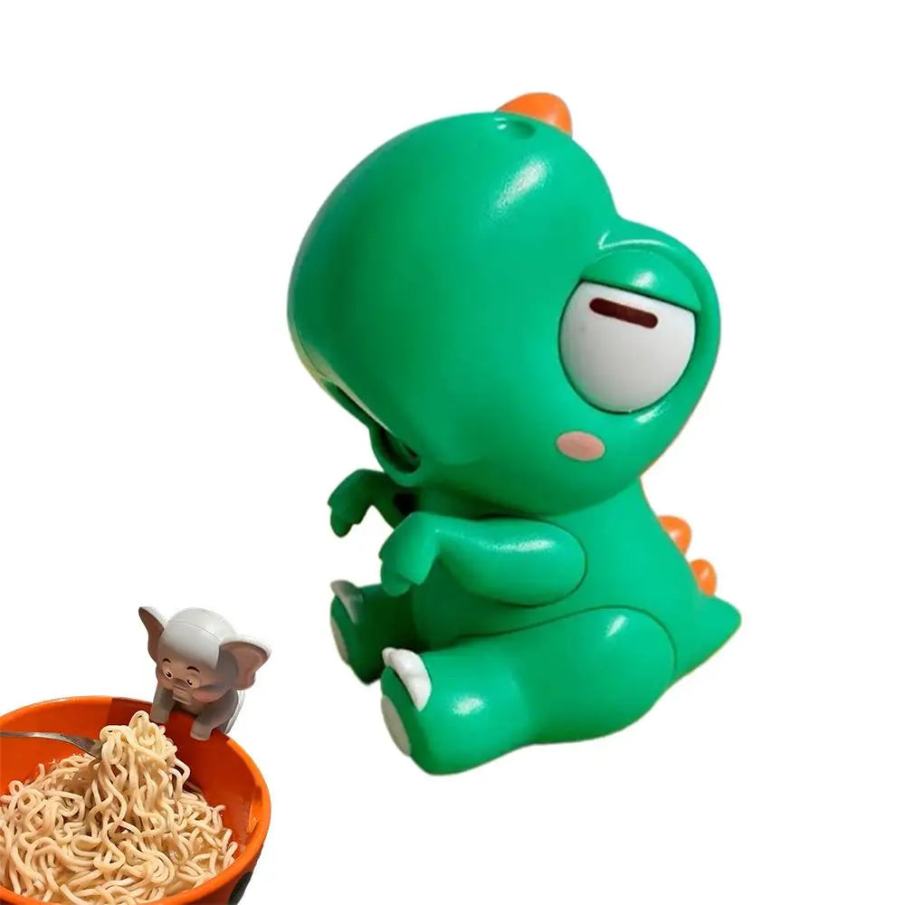 The Green Dinosaur design photographed alone, seated with a slot in the face as the air outlet and orange spines along its back
