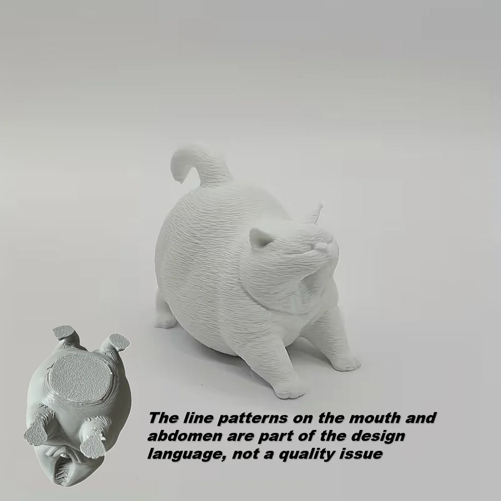 Estatua de gato bostezando como decoración de escritorio