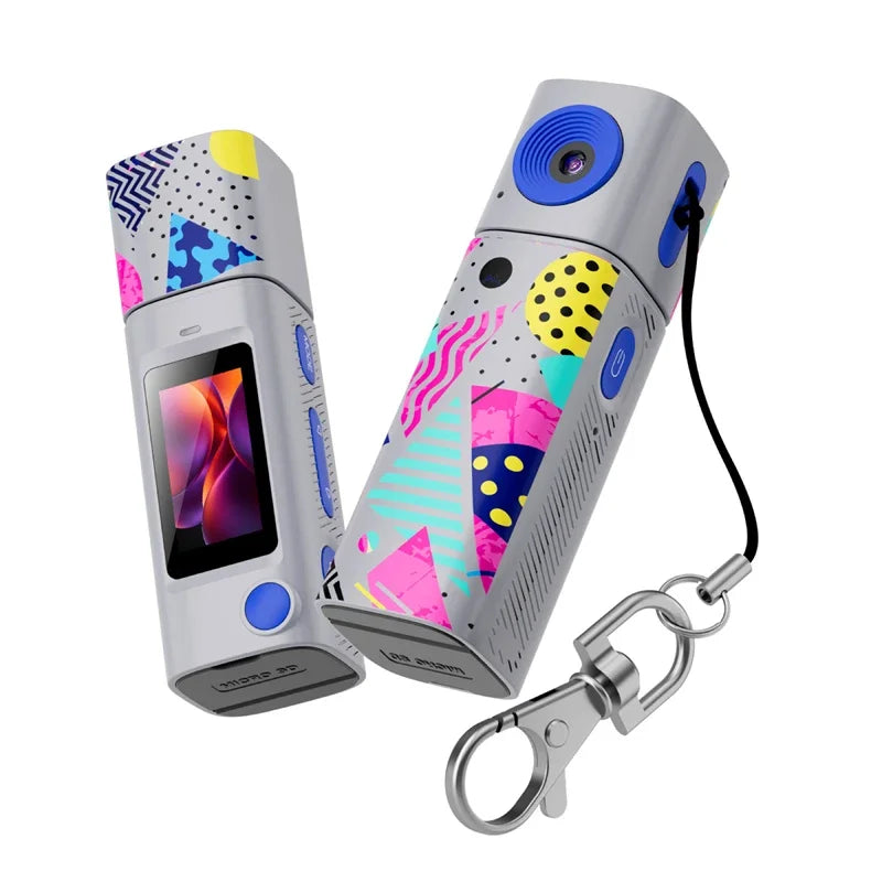 Grey keychain mini camera with an eighties pattern print