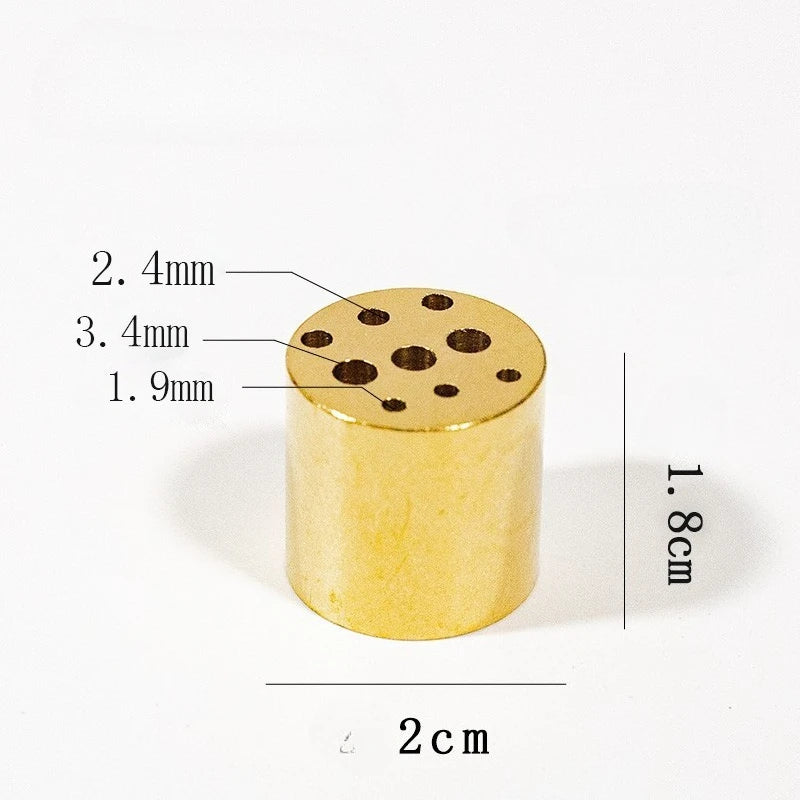 Maker's measured photograph of the multi-hole barrel: 1.8 cm tall, 2 cm wide, with holes of 1.9, 2.4 and 3.4 mm