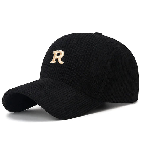 Black corduroy baseball cap with a cream 3D embroidered letter R
