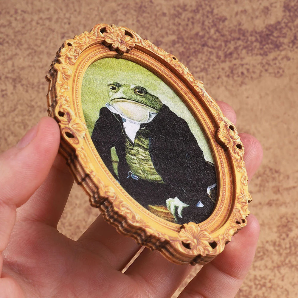 Side view of the frame magnet held in a hand