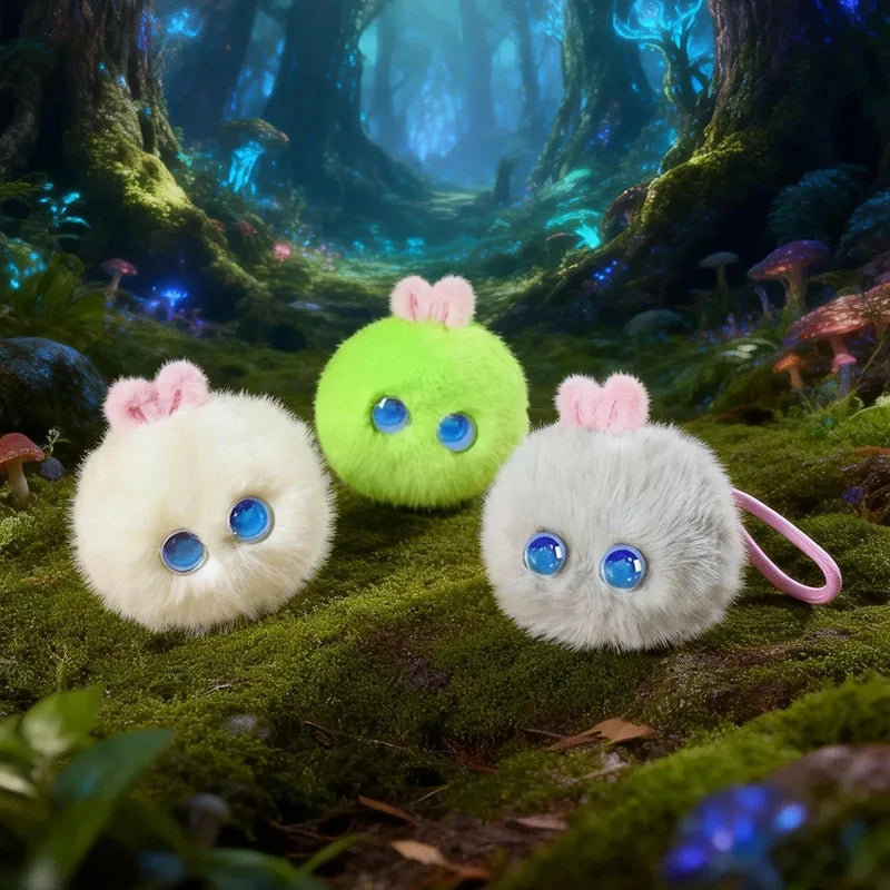 Three pom-pom charms in cream, green and grey on a computer-generated glowing forest floor