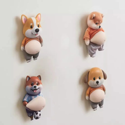 Four squishy-bellied cartoon dogs stuck to a white wall