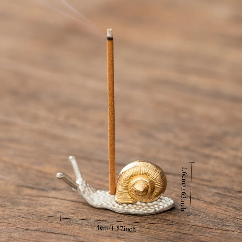 Silver Snail metal stick incense holder, maker size graphic shown