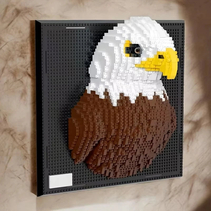 Brick built bald eagle head on a black studded panel against a pale wall, showing the slot moulded into the top edge of the board