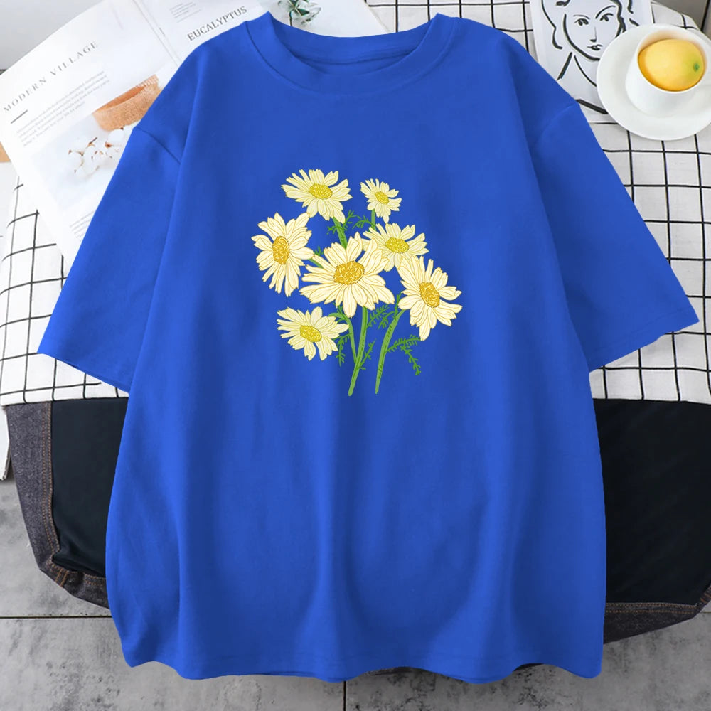 Royal blue short-sleeve cotton t-shirt printed with a bouquet of yellow and cream daisy-like chrysanthemums