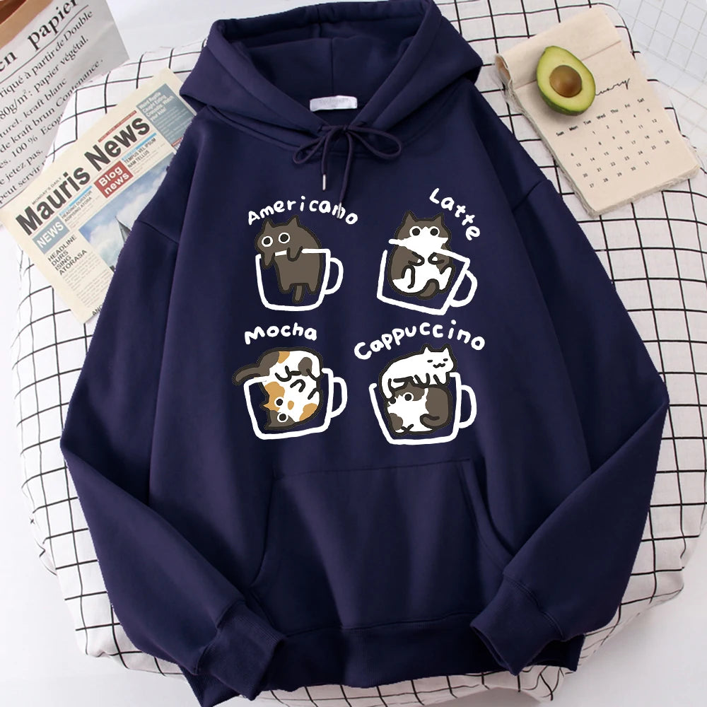 Navy pullover hoodie with a chest print of four cartoon cats sitting in outlined coffee mugs