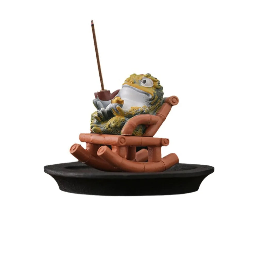 The same toad and chair standing on a flat black oval base