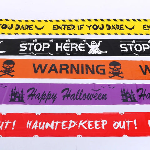 Halloween barrier tape, five printed designs laid side by side