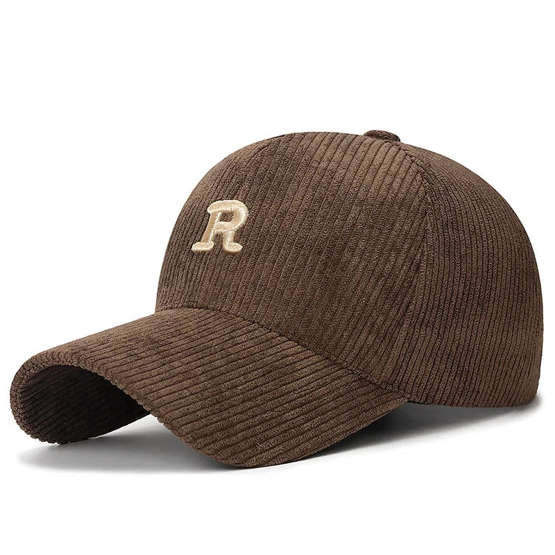 Dark brown corduroy baseball cap with a cream 3D embroidered letter R