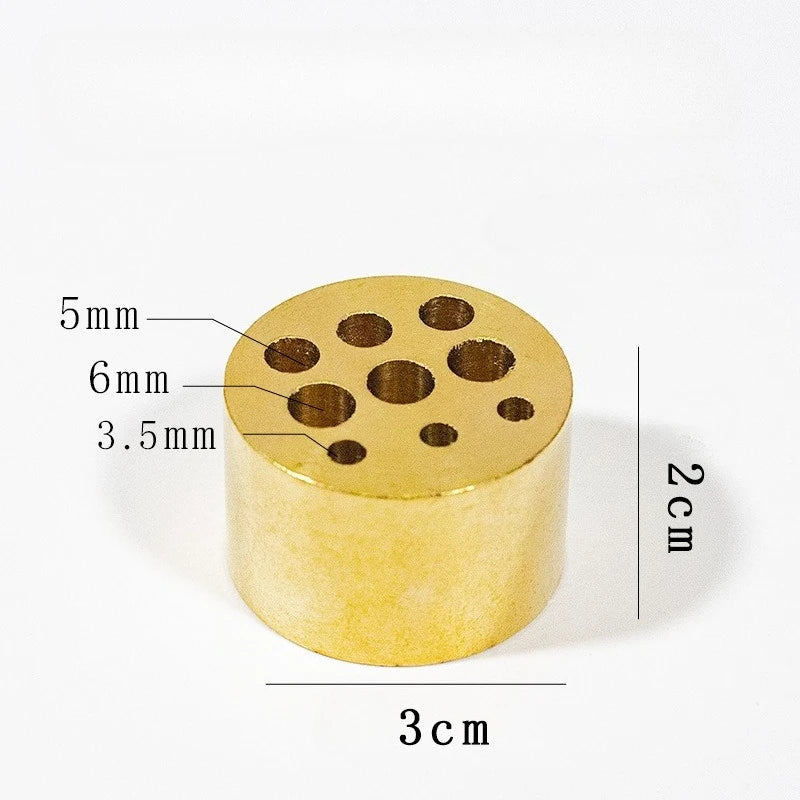 Maker's measured photograph of the large multi-hole barrel: 2 cm tall, 3 cm wide, with holes of 3.5, 5 and 6 mm