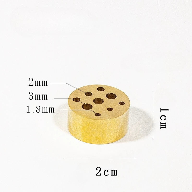 Maker's measured photograph of the multi-hole disc: 1 cm tall, 2 cm wide, with holes of 1.8, 2 and 3 mm