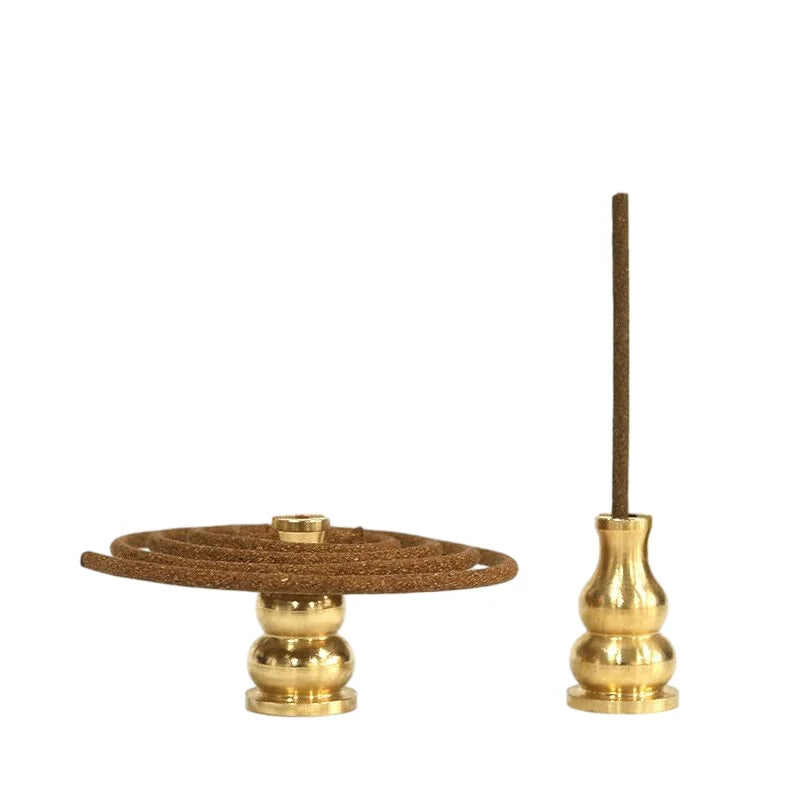 A spiral incense coil resting on one of the small holders beside the gourd post - neither the coil nor the sticks are included