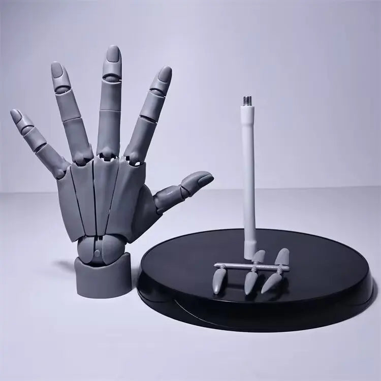 Grey hand model next to its black round base, threaded support rod and four loose fingertip pieces