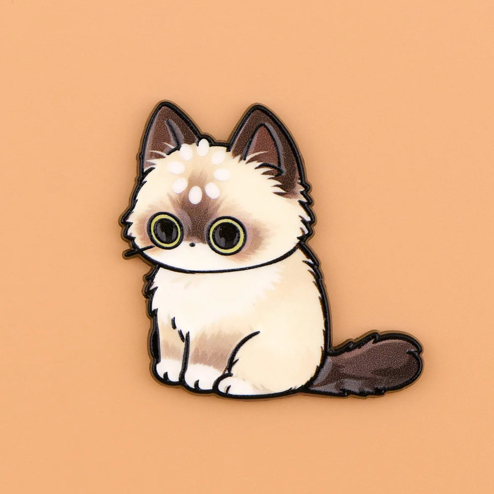 Cream longhair cat magnet with a dark brown face and tail