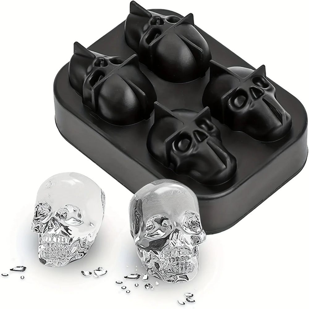 The four cavity tray, a thick silicone block holding four deep skulls