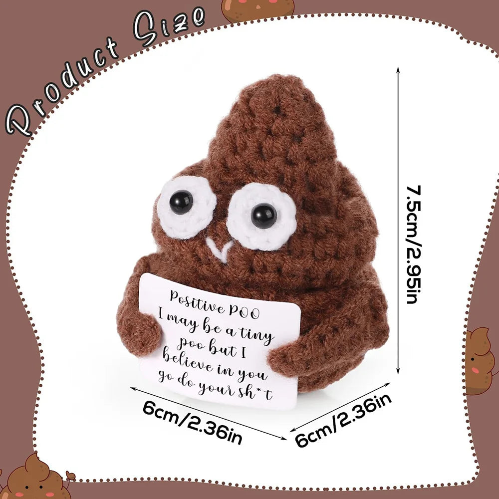 Crochet positive affirmation doll holding an encouragement card