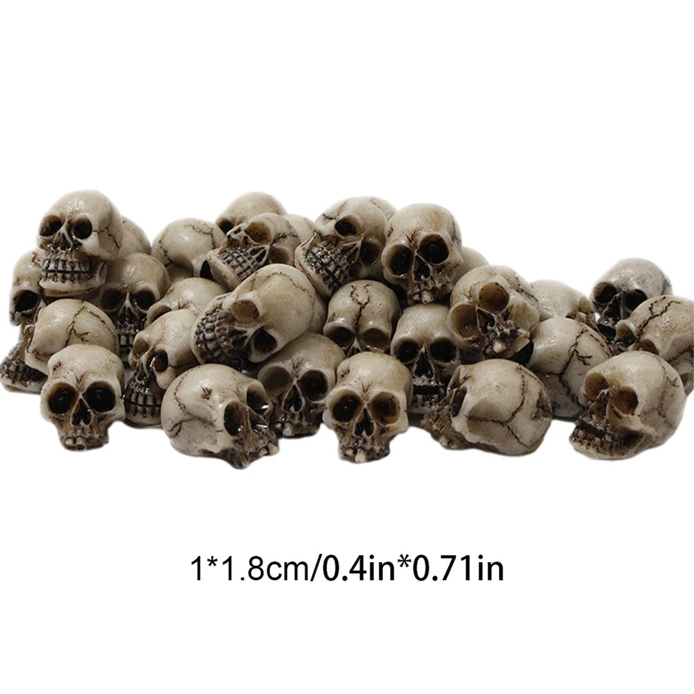 The maker's own size callout - each skull is 1 x 1.8 cm, about 0.4 x 0.71 inches