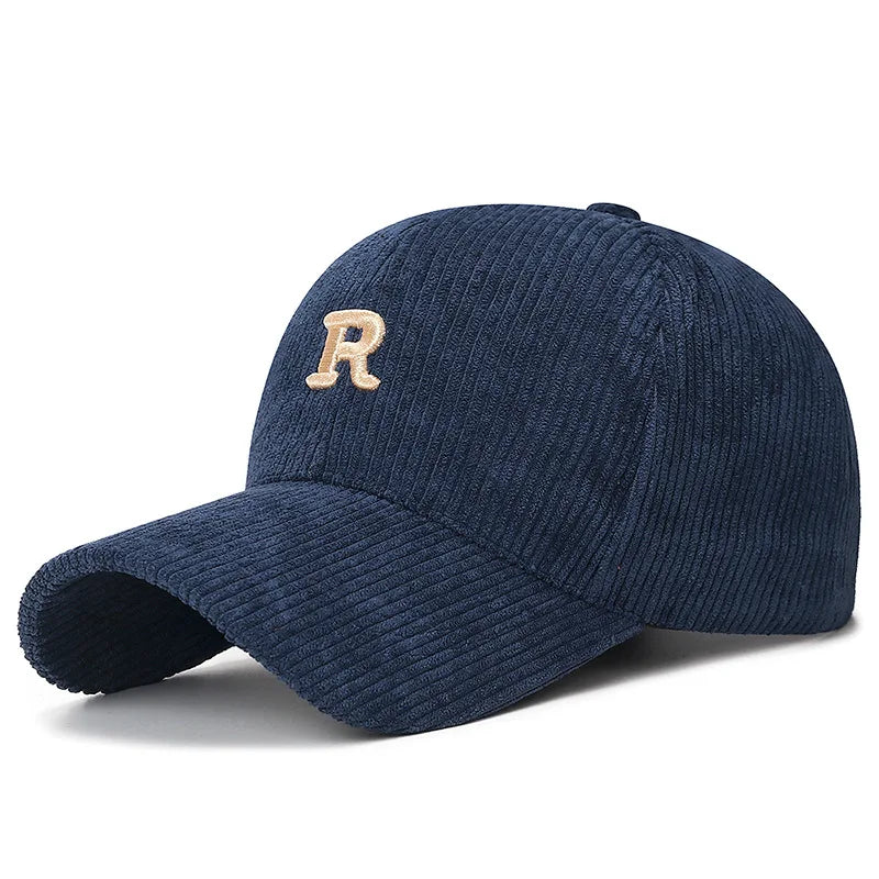 Navy blue corduroy baseball cap with a cream 3D embroidered letter R
