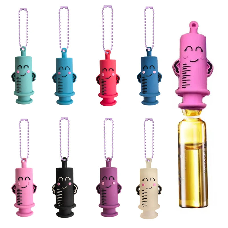 Every keychain design shown together with a glass ampoule