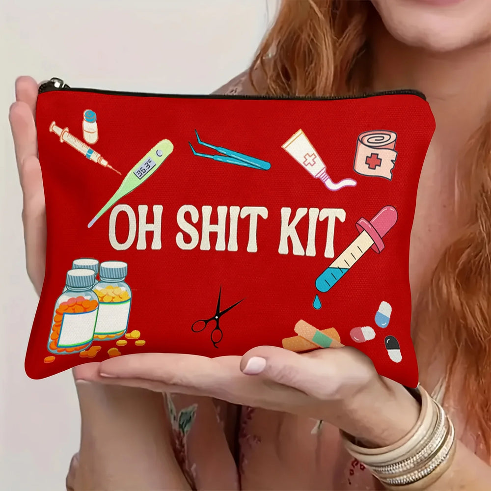 Red printed zip pouch held flat in two hands, showing the full front artwork
