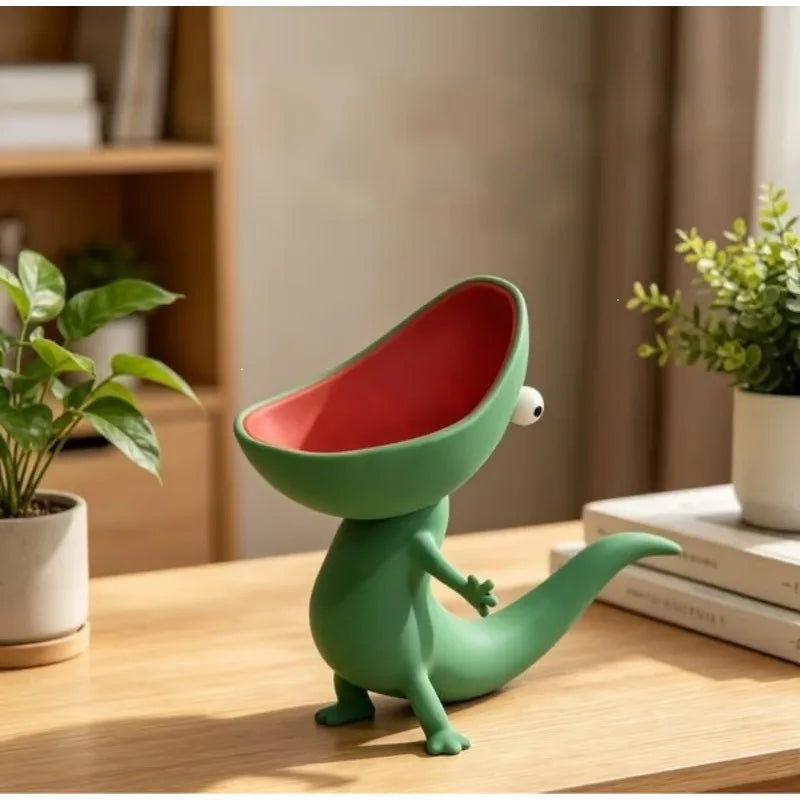 The same green lizard soap dish photographed from the other side, tail curving to the right