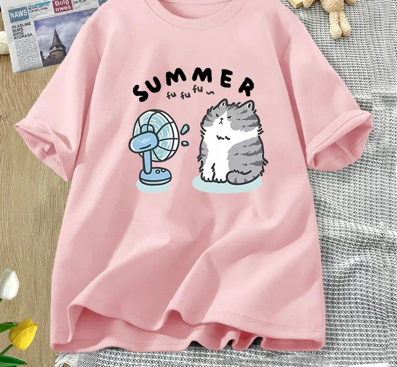 Summer cat and fan tee in pink, chest print of a cartoon cat cooling off in front of an electric fan